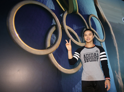 Hsu Shu-ching se voit remettre la médaille d’or des Jeux Olympiques de Londres