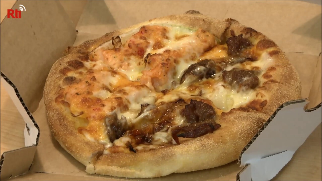 Pizzas cuites au four 24/7 : sur place ou à emporter !